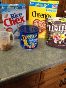 Grandma's Easy Snack Mix Recipe! Simple and quick. Delicious for all ages! Cheerios, Chex Mix, M&Ms, YUMMY!, peanuts, white chips, chocolate chips