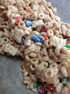 Grandma's Easy Snack Mix Recipe! Simple and quick. Delicious for all ages! Cheerios, Chex Mix, M&Ms, YUMMY!, peanuts, white chips, chocolate chips