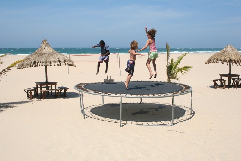 kids at the beach on a trampoline - Make Earth Day Every Day (With Spin Master)