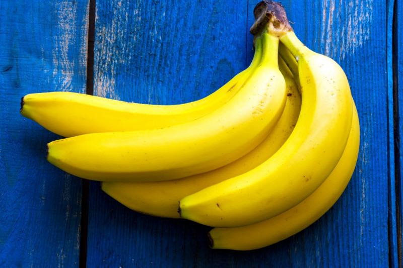 Bananas on dark blue background