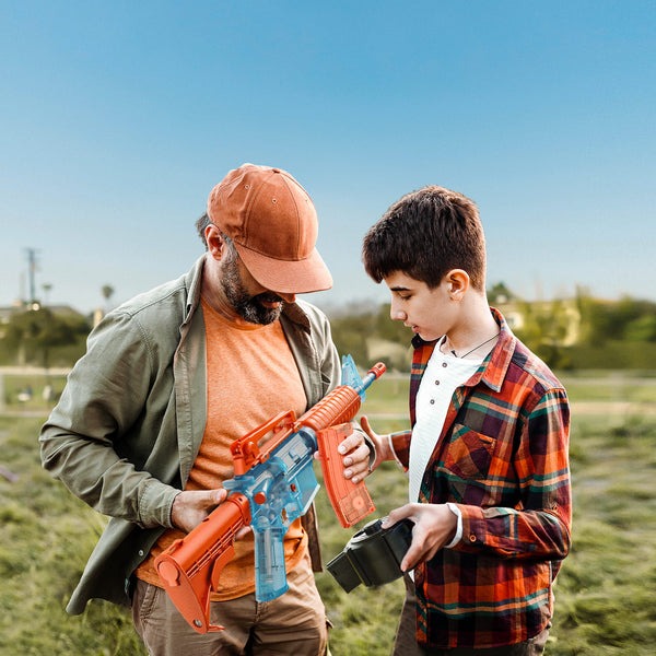 Father and son holding a Bwine M4A1 Electric Gel Ball Blaster