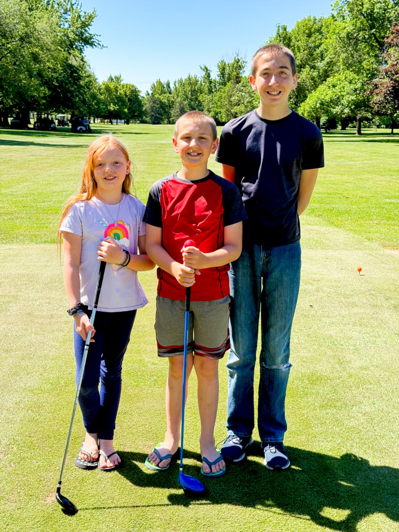 Kids golfind. Minnesota Summers For Our Farm Family.