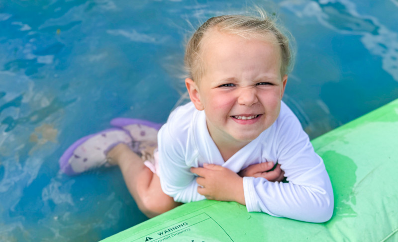 Girl on waterpark. Minnesota Summers For Our Farm Family.