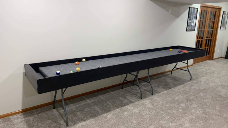 The Newbern Shop Carpetball Table: The Ultimate Gift for Family Fun.