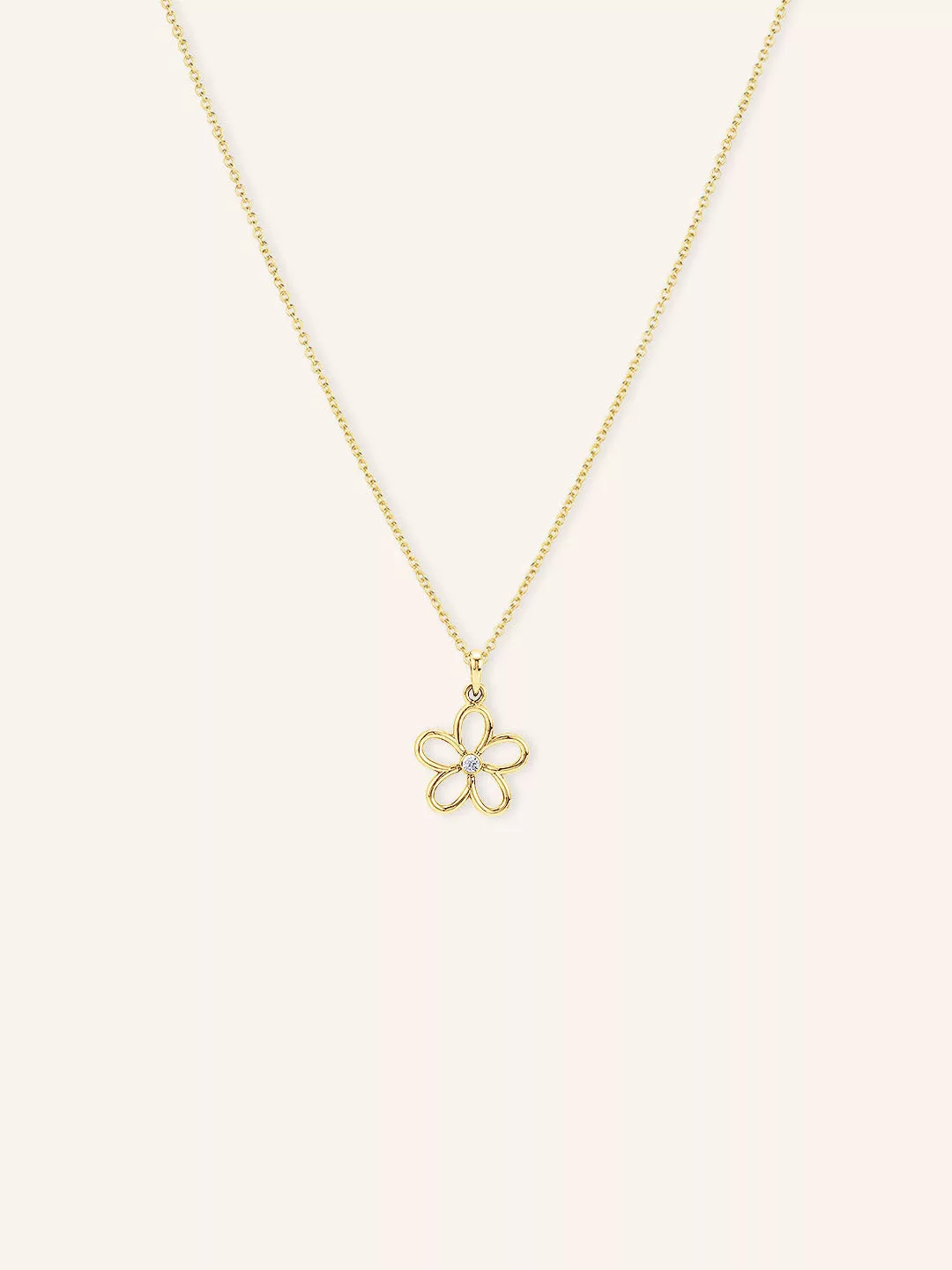 A gilded leaf solid gold daisy necklace